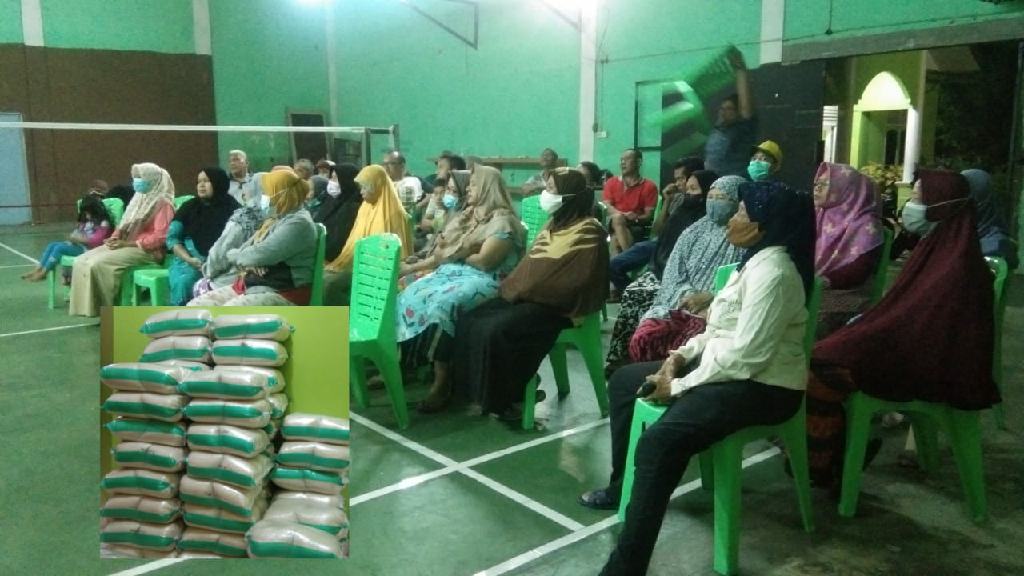 Ketua RT Nurhayati Distribusikan Bantuan 500 Kg Beras Kepada Warga Terdampak Covid-19