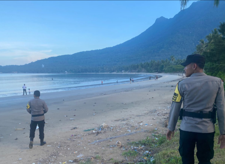 Kapolsek Bunguran Timur Imbau kepada Wisatawan Pantai Tanjung Tetap Waspada