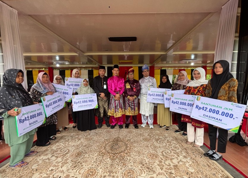 BPJS Ketenagakerjaan Serahkan Santunan Kematian Peserta DBH Sawit di Momen HUT Kuantan Singingi ke-26