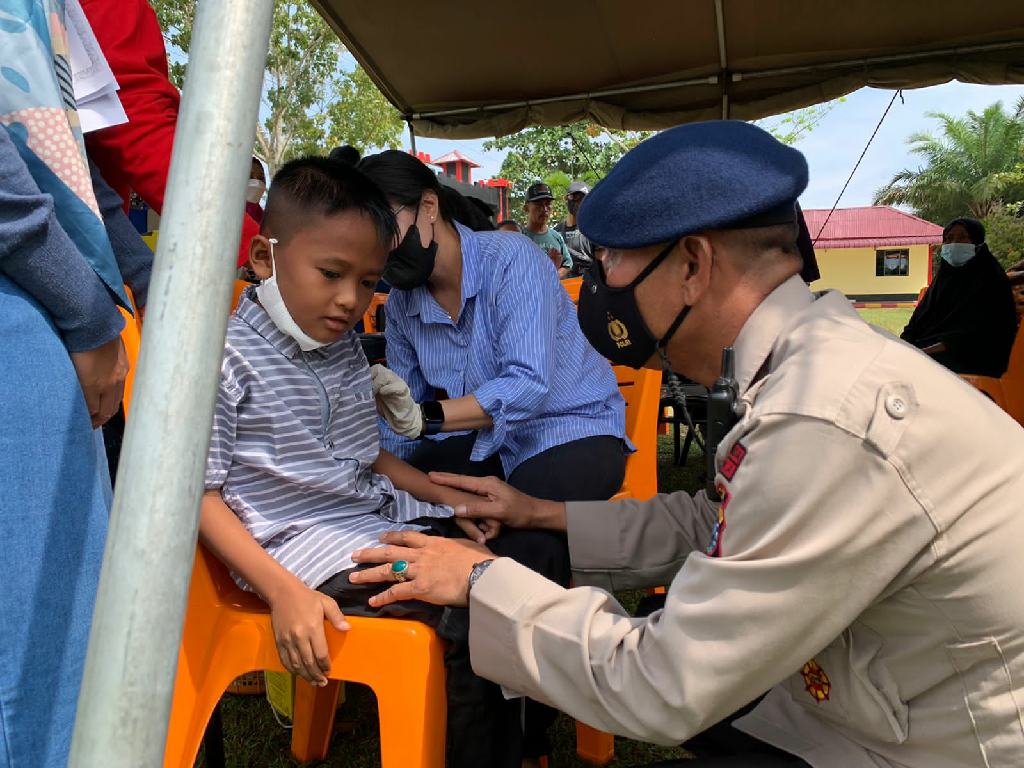 Batalyon B Pelopor Sat Brimob Polda Riau Gelar Vaksinasi Untuk Anak Umur 6-11 Tahun