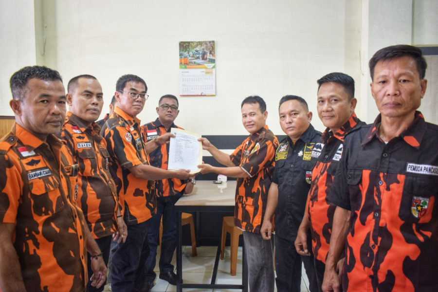 Diiringi 100 Anggota Pemuda Pancasila, Army Chaniago Serahkan Berkas Pendaftaran Ketua MPC Kuansing Periode 2023-2027