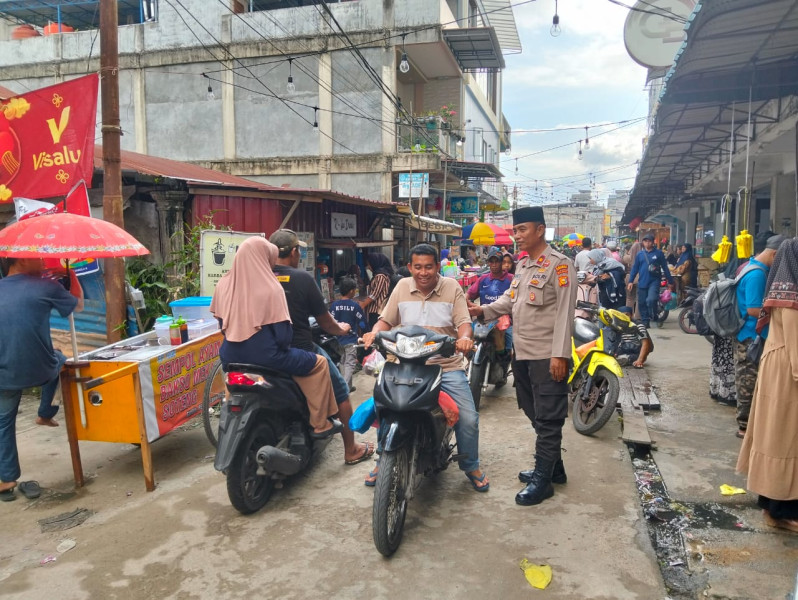 Polsek Kateman Gelar Patroli Pasar Ramadhan untuk Jaga Keamanan dan Kenyamanan Warga