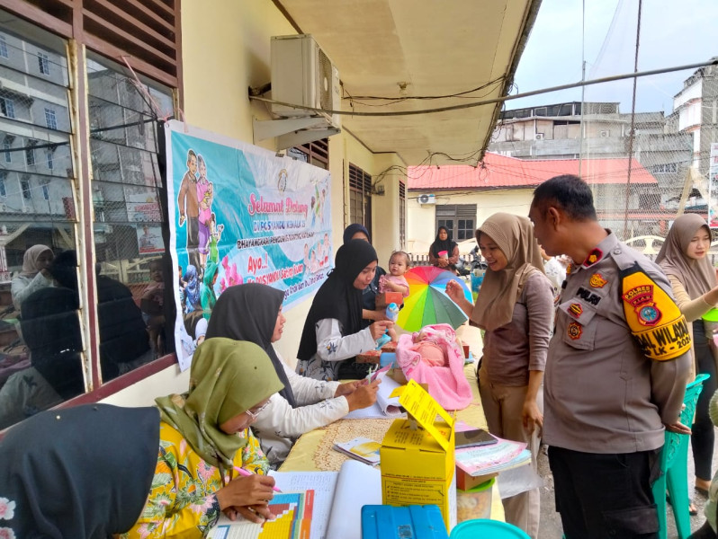 Kapolsek Kateman Laksanakan Cooling System Melalui Sosialisasi Pilkada di Posyandu Kemala Bhayangkari