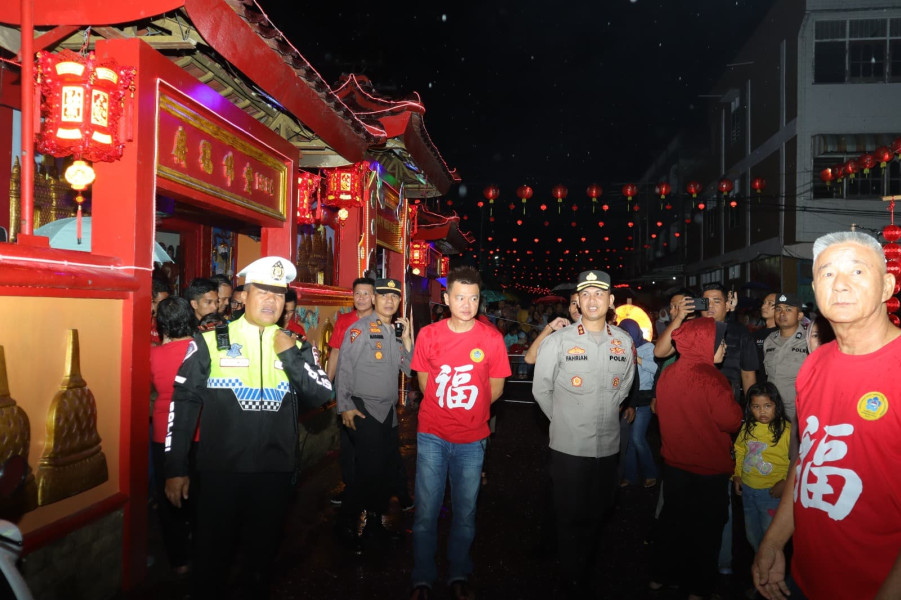 Meski Diguyur Hujan, Perayaan Imlek di Inhu Meriah, Polres Inhu Laksanakan PAM