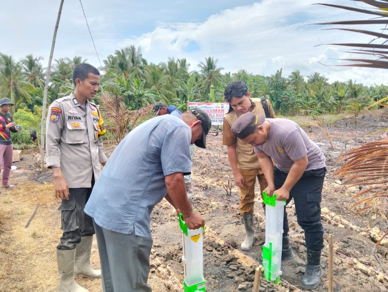 Polsek Kateman Gelar Apel Bersama dan Green Policing di MI Tarbiyah Islamiyah Sungai Guntung