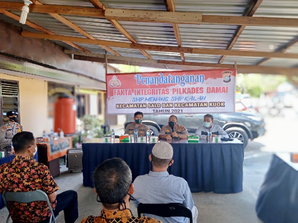 Kapolres Kampar Sampaikan Pesan Kepada Calon Kades Saat Deklarasi Pilkades Damai di Polsek Jajaran