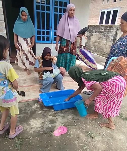 Turun Mandi, Tradisi Sakral Menyambut Bayi Baru Lahir di Kuantan Singingi