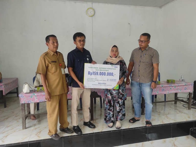 BPJS Ketenagakerjaan Kuansing Sosialisasi Program dan Serahkan Santunan Jaminan Kematian serta Beasiswa Senilai Total Rp 159 Juta di Desa Koto Sentajo