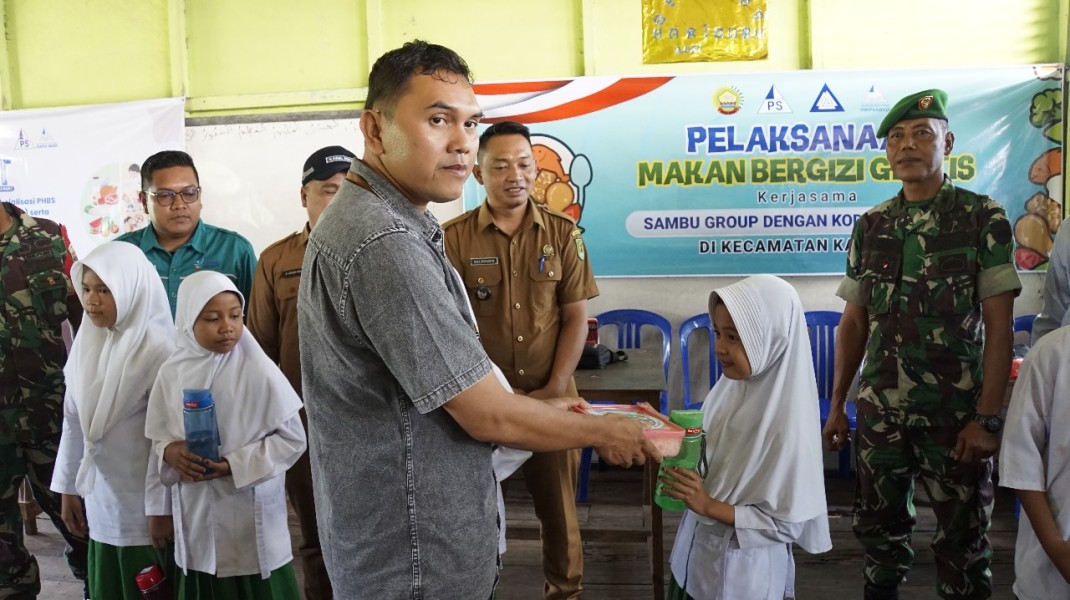 Sinergi Sambu Group dan Kodim 0314/Inhil Gelar Gerakan Makan Bergizi di Desa Penjuru, Kecamatan Kateman