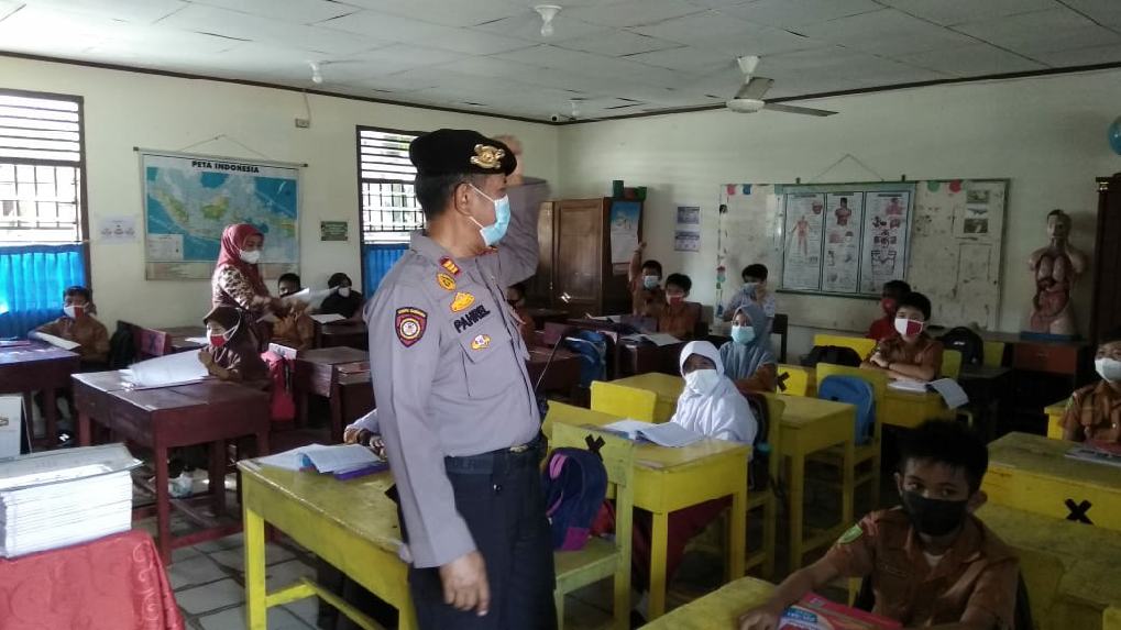 Polsek Bukit Raya Lakukan Operasi Yustisi Pemburu Teking Covid-19 Dalam Proses Belajar Tatap Muka 