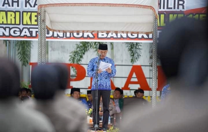 Pimpin Upacara Harkitnas, Bupati Rohil Afrizal Sintong Sampaikan Amanat Menteri Kominfo