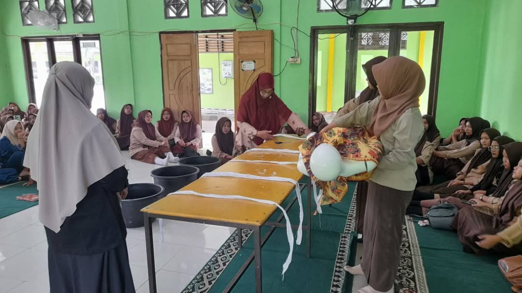 Siswi SMKN 1 Seberida, Praktik Penyelengaraan Jenazah Perempuan